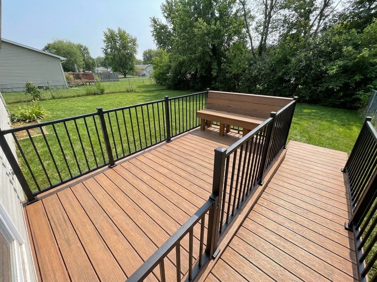 New composite deck with black railing after rebuild